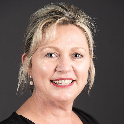 Head shot of a woman named  Meg Mendham who is the CEO of Community Connections Solution Australia