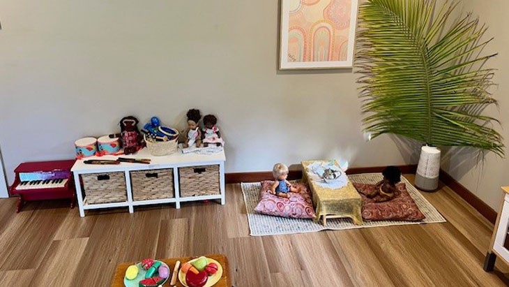 An imaginative play setup in the corner of a family day care venue.