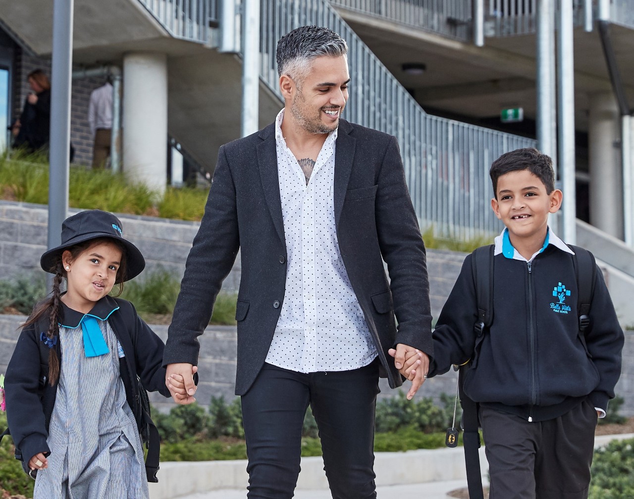 Dad walking students to school