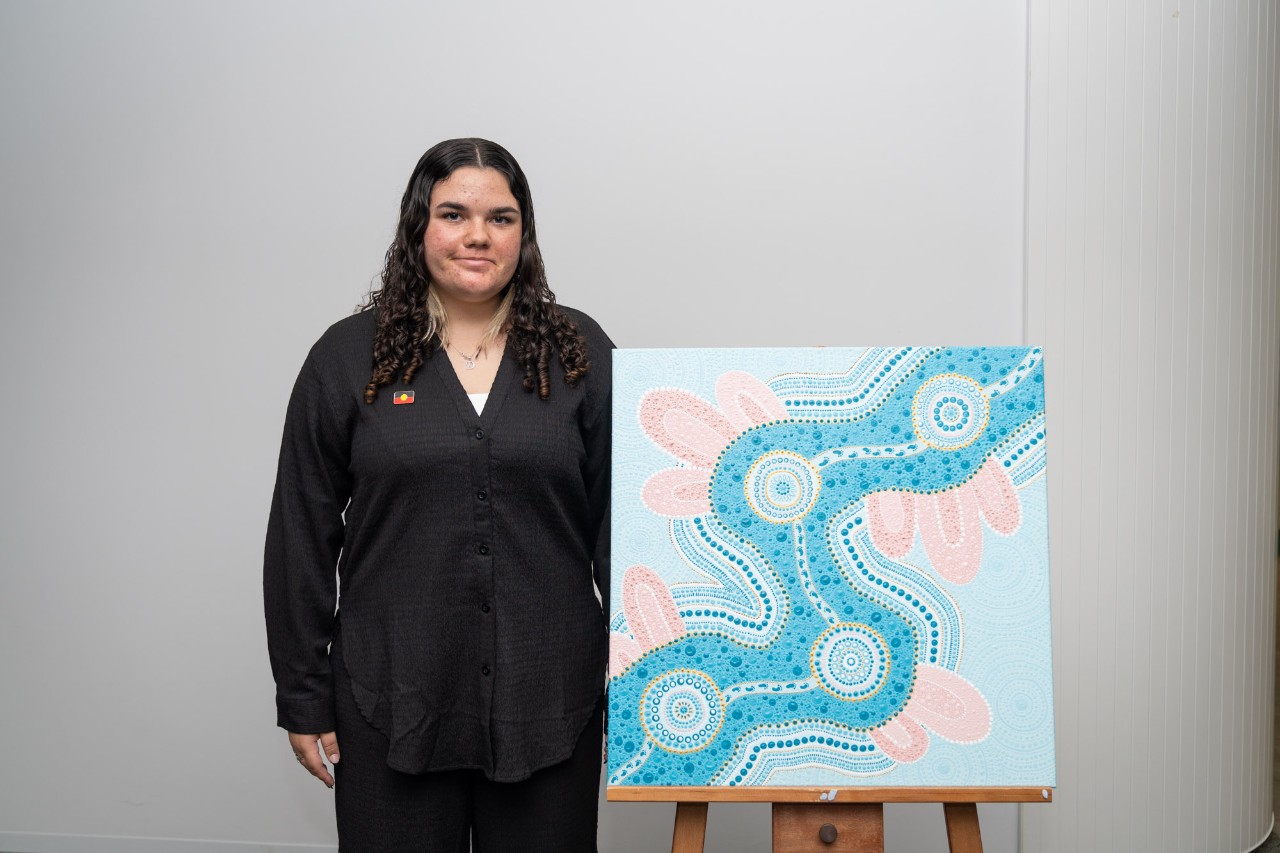 Dakotah Ballangarry and her artwork.