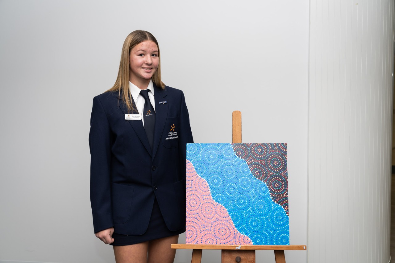 Chelsea Cooper and her artwork.