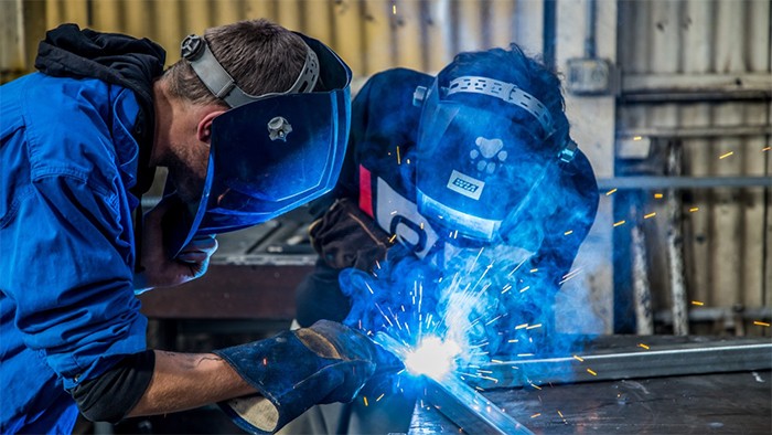 Apprentice welding.