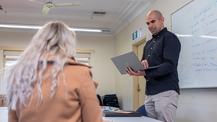Male VET teacher in classroom