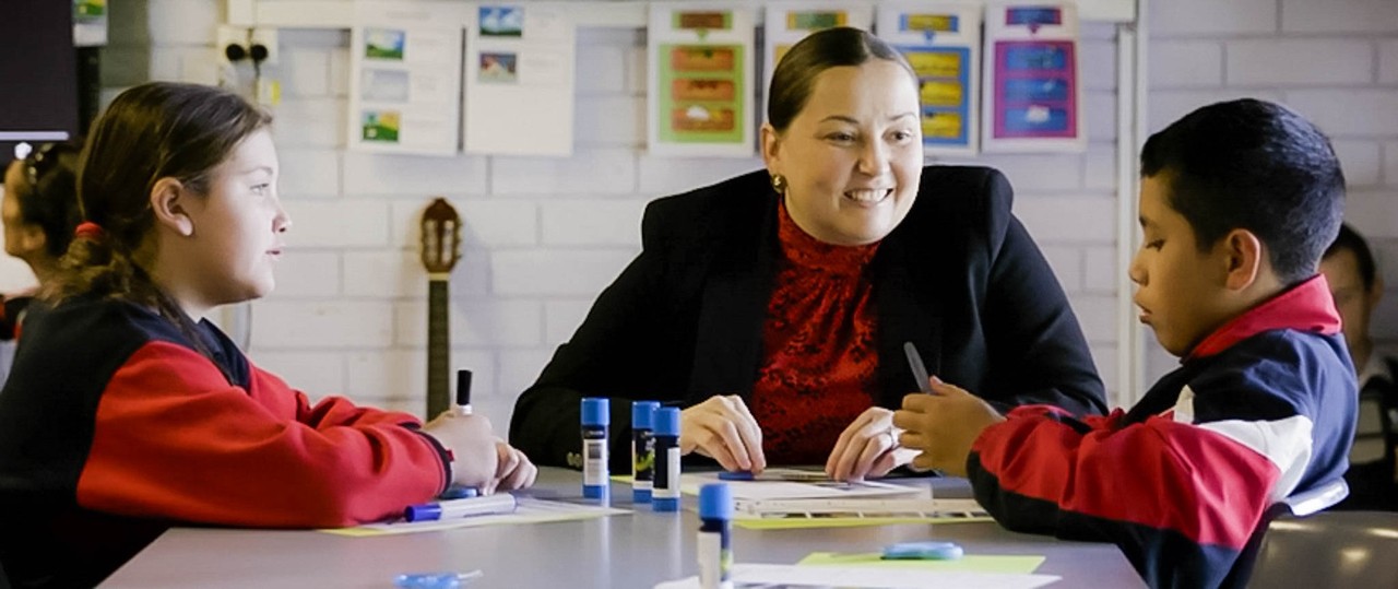 Female student speaking with student