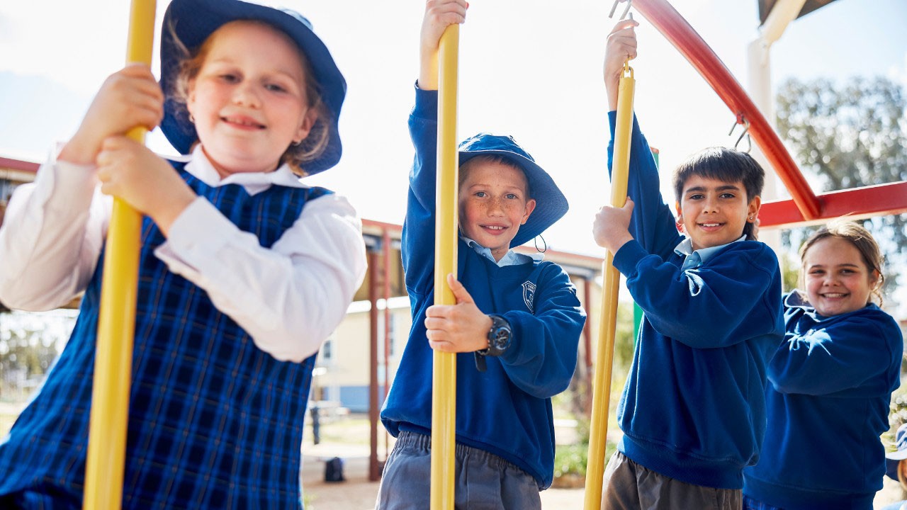 Students on playground equipment