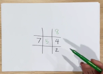 a three columns tic tac toe, middle row with numbers 7, 5 and 4. the last column with numbers 8, 4 and 2