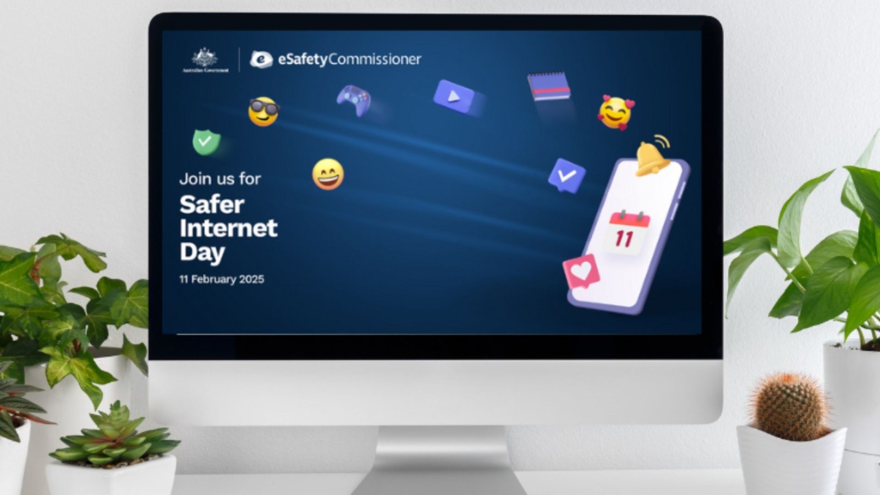 Computer with Safer Internet Day slideshow.