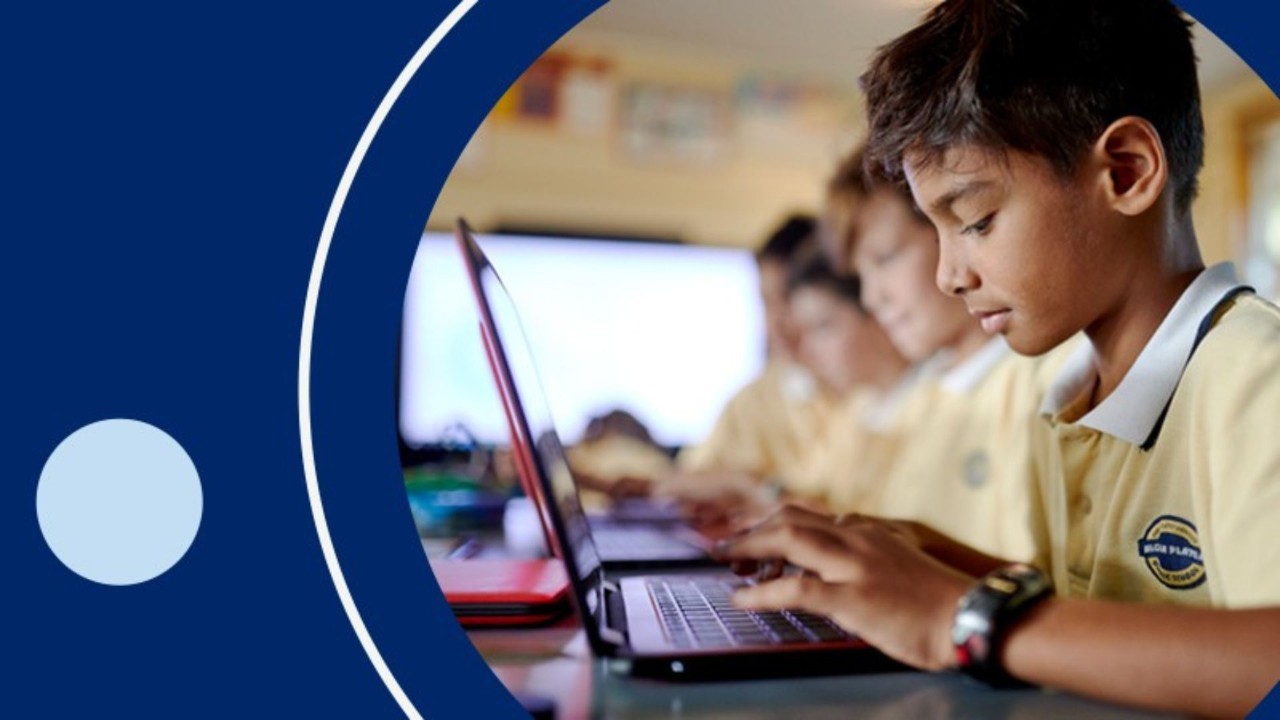Students using a laptop