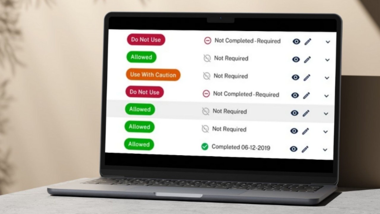 Laptop with the AssessedIT dashboard.