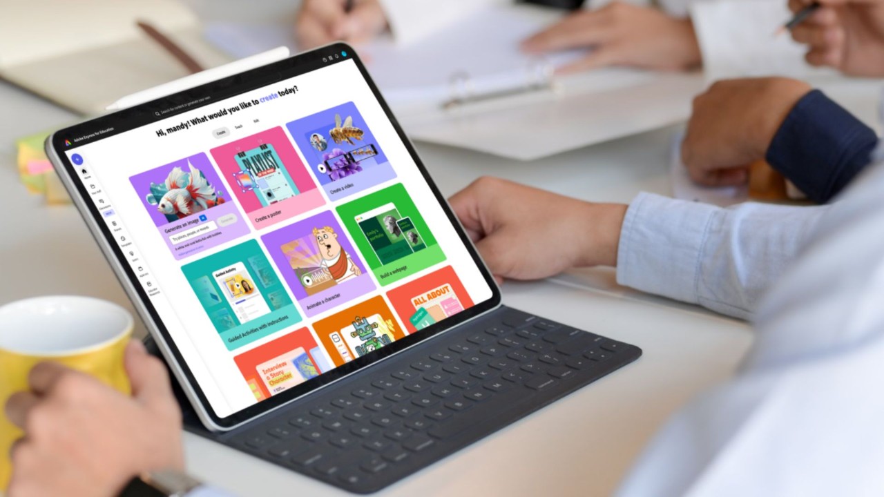 A laptop showing the Adobe Express interface.