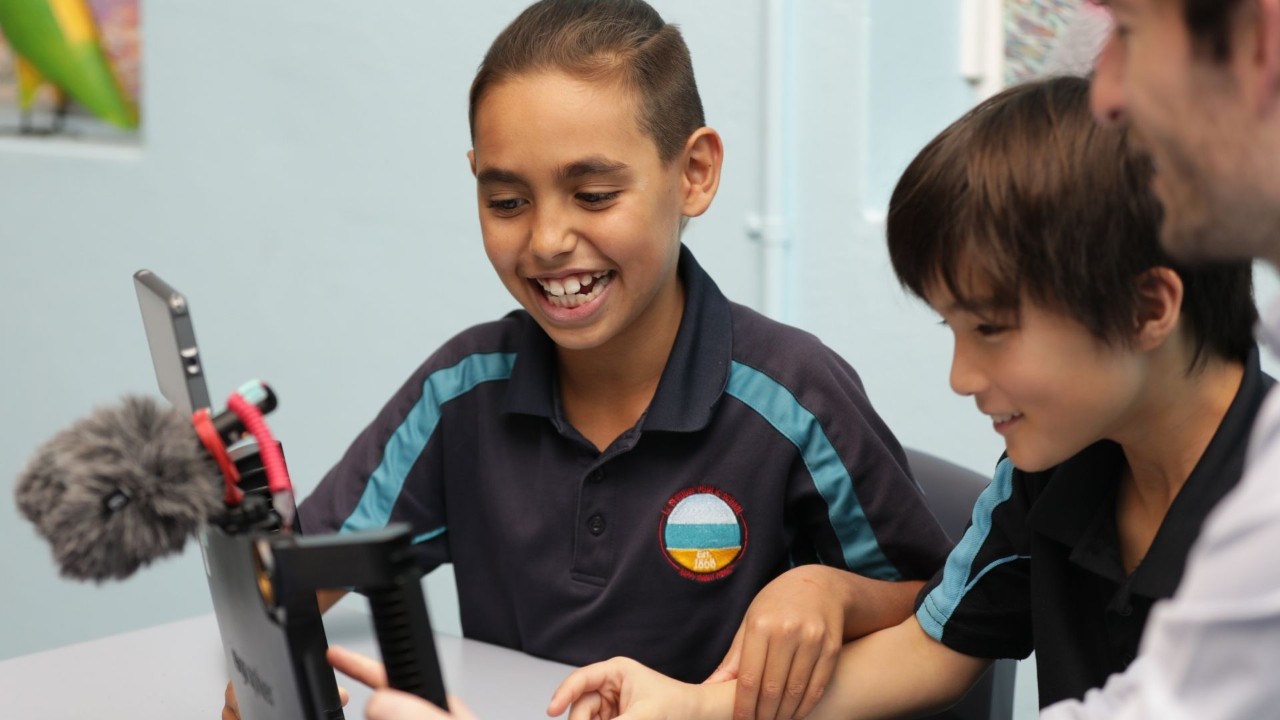 Students using the filming kits