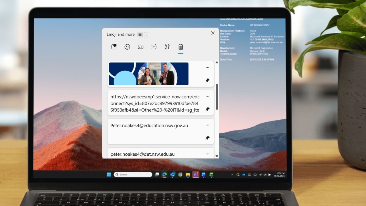 Laptop showing Windows V shortcut menu.