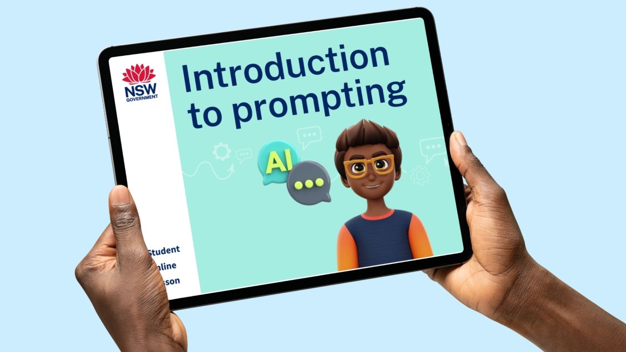 Hands holding a tablet device with a slide on the screen saying introduction to prompting.