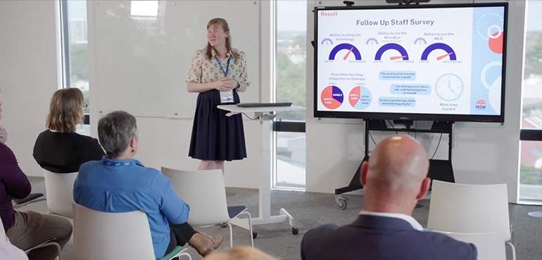 Amy Greenwood presenting the follow up survey findings.